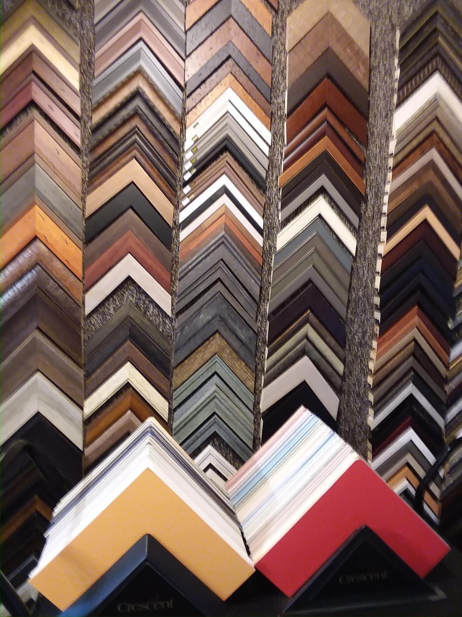 Picture frame moulding samples display at All That MATTERS